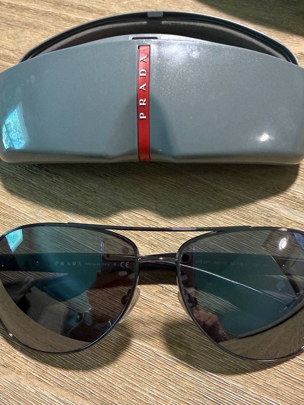 Prada Black Aviator Sunglasses with Gray Case and Red Logo